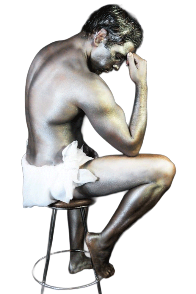 male-seated-on-barstool
